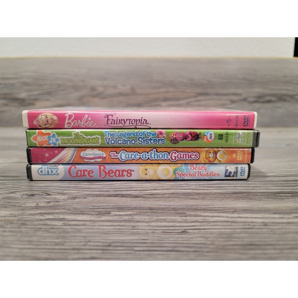 Kids lot of 4 DVD all work good 2 Care Bears  The Backyardigans Barbie